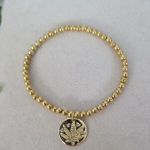 Brass Bead Stretch Bracelet with Mary Jane Leaf Charm